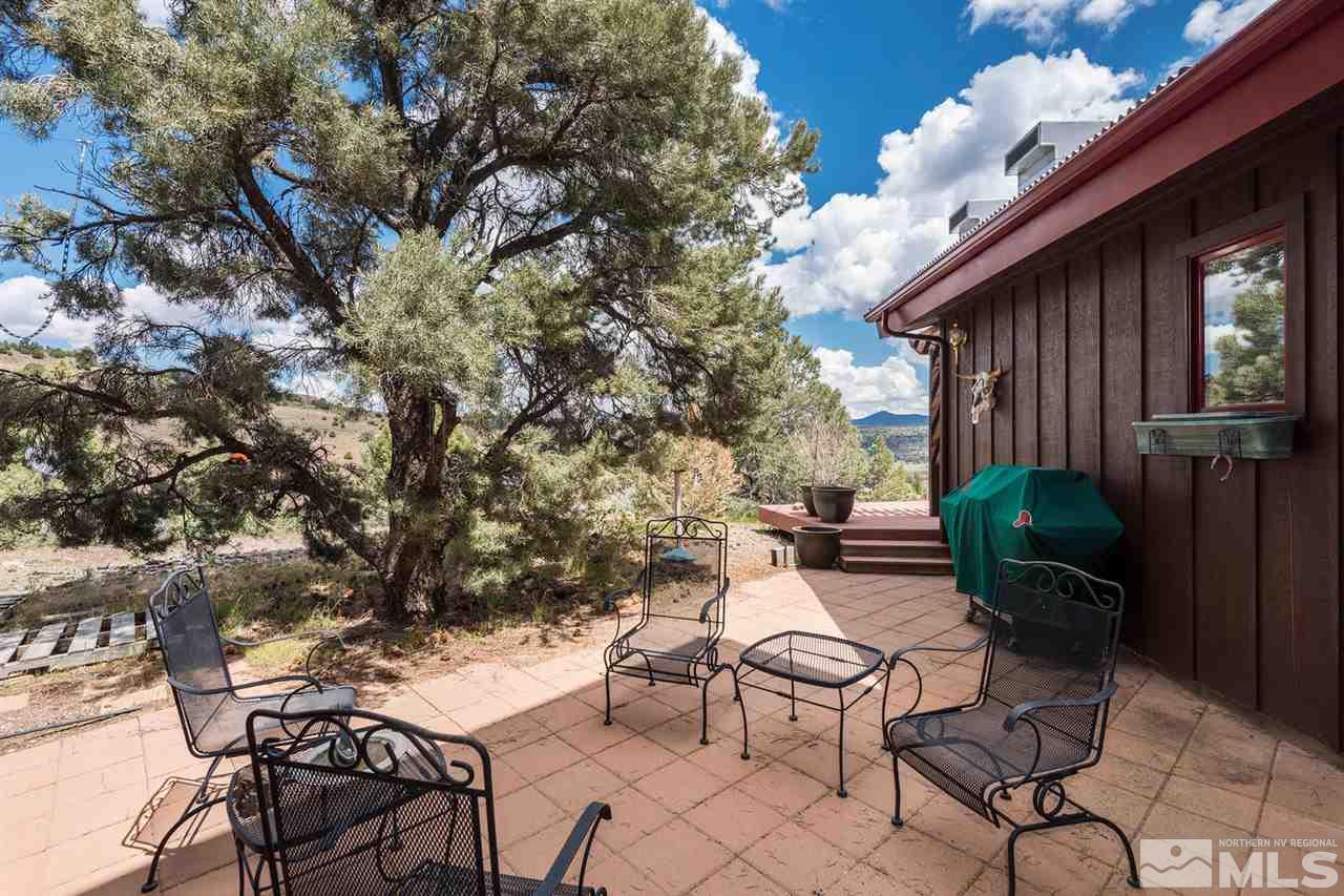 2570 Musket Road Reno, NV 89521 - Photo 20 of 25 a view of a backyard with furniture and a grill