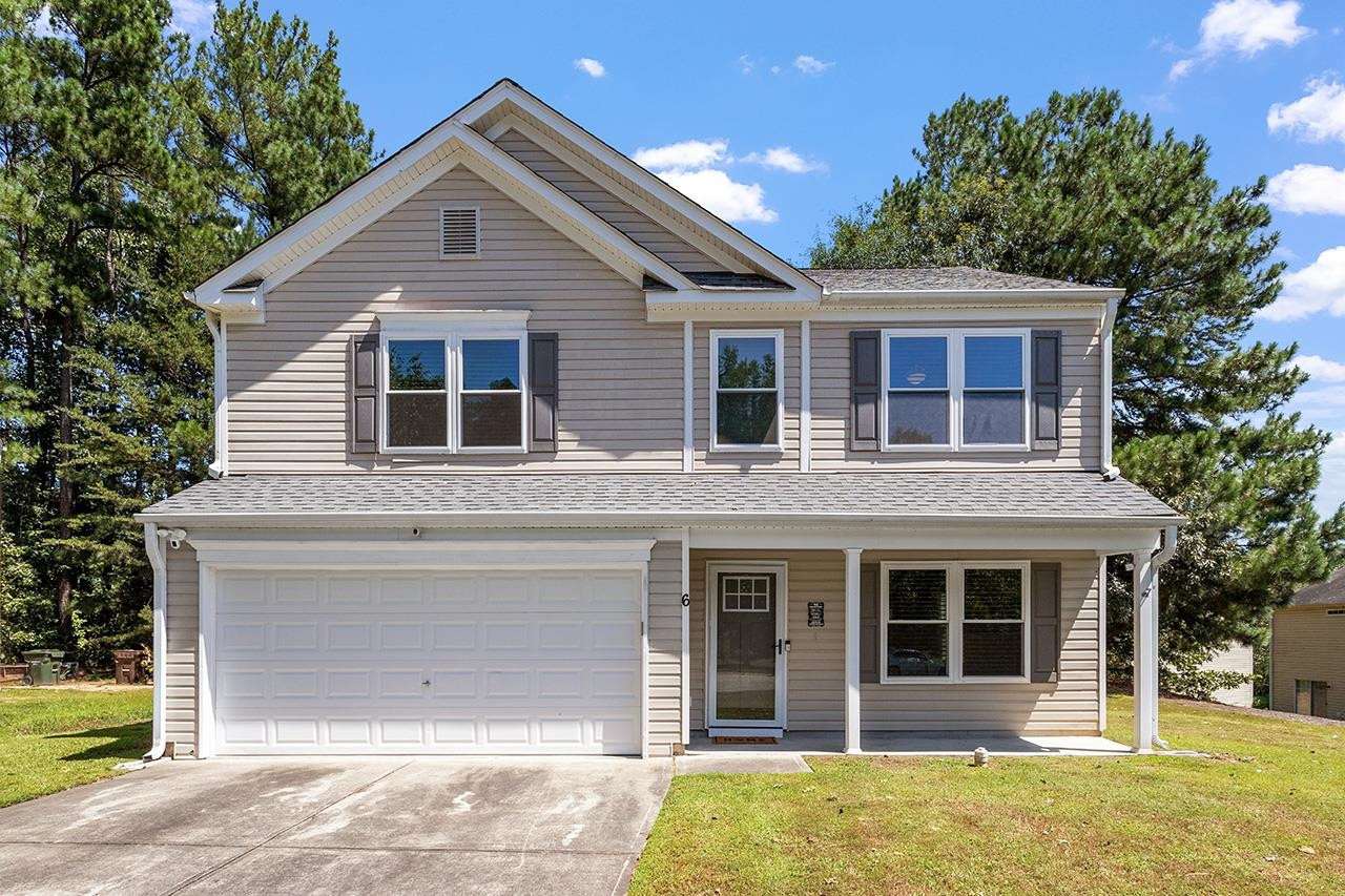 6 Esterbrook Court Durham, NC 27703 - Photo 1 of 31 a front view of a house with garden