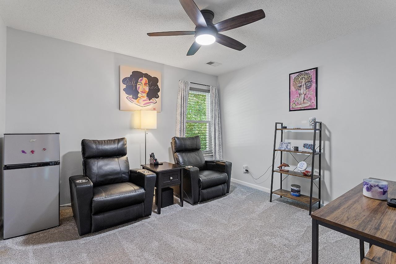6 Esterbrook Court Durham, NC 27703 - Photo 22 of 31 a living room with furniture and a window
