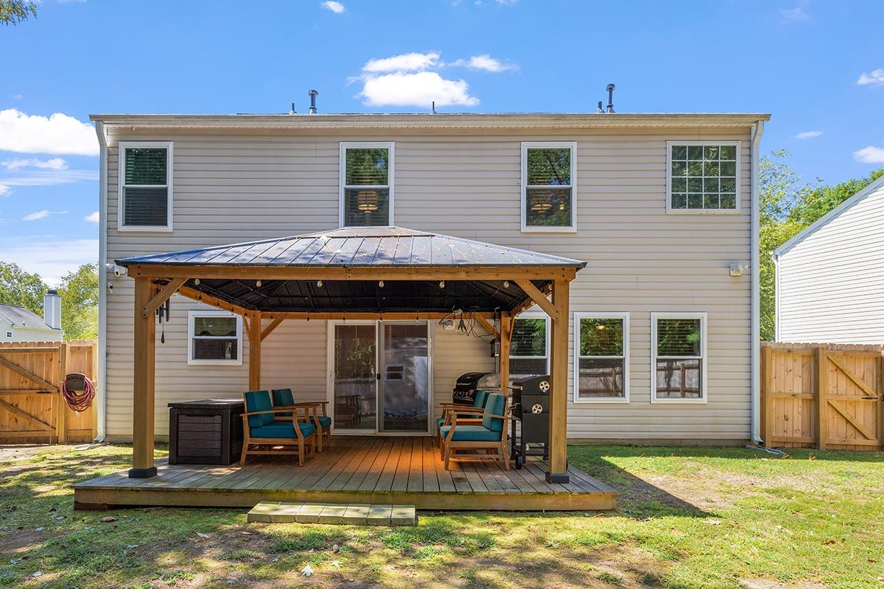6 Esterbrook Court Durham, NC 27703 - Photo 28 of 31 a view of a house with swimming pool and a porch