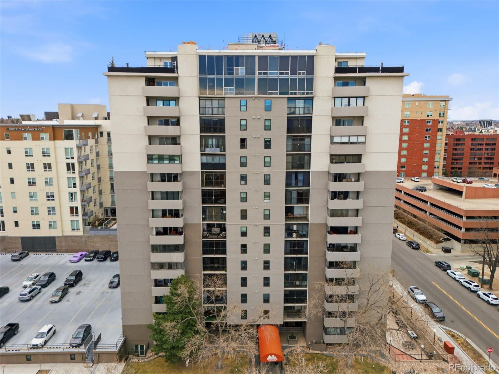 2 Adams Street, Unit 105 Denver, CO 80206 - Photo 12 of 50 a city view with tall buildings
