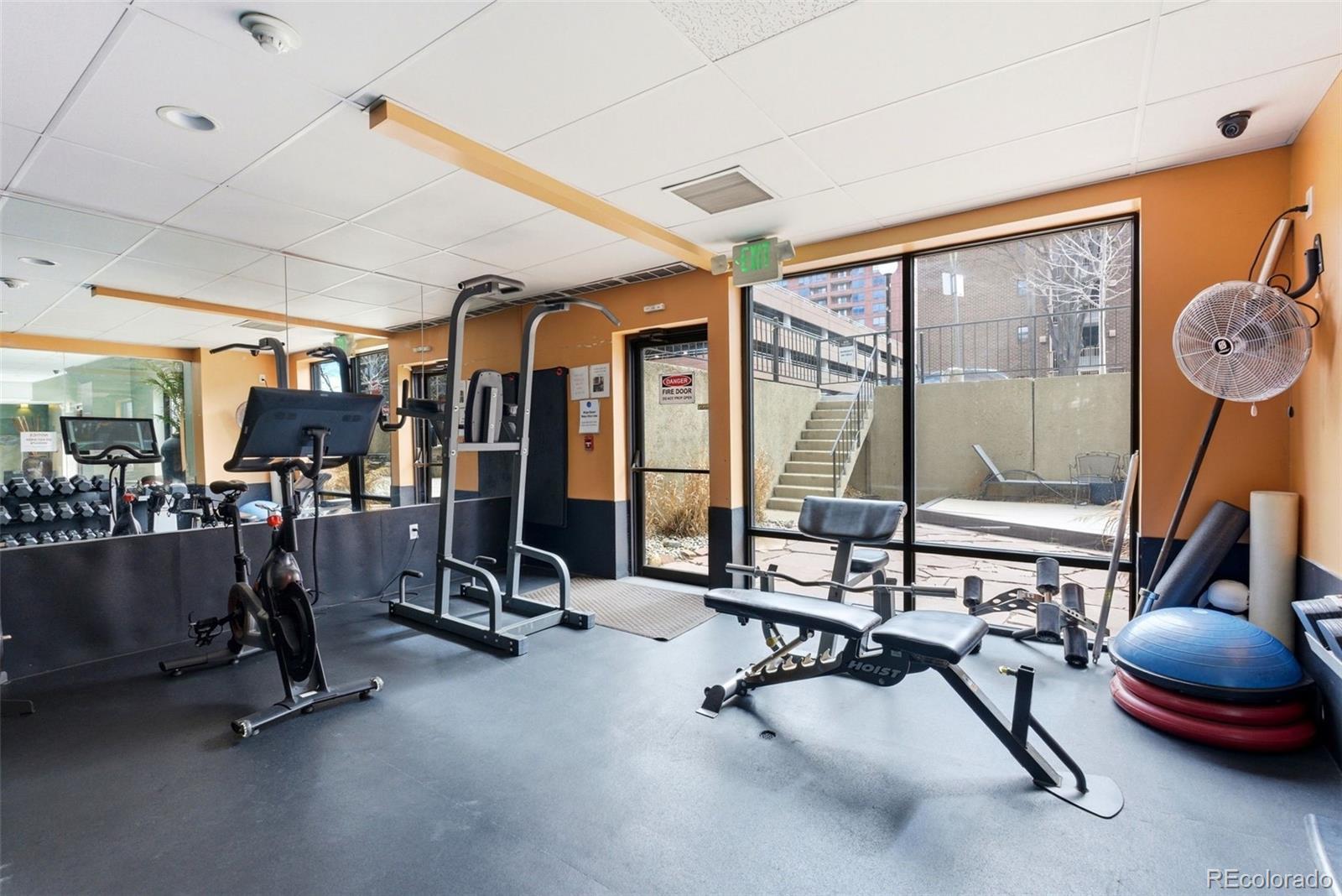 2 Adams Street, Unit 105 Denver, CO 80206 - Photo 18 of 50 a view of a room with gym equipment