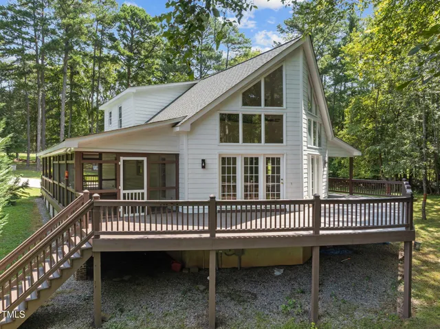 a view of a house with a roof deck