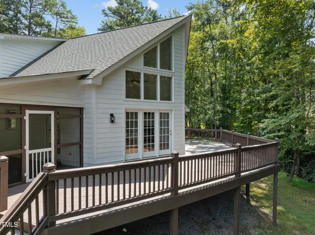 a balcony view with a garden