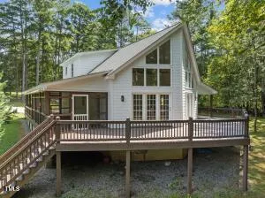 a view of a house with a roof deck