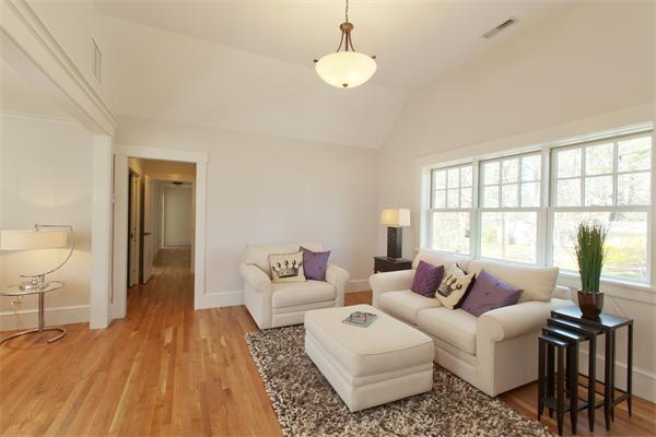 181 Alcott Road Concord, MA 01742 - Photo 13 of 26 a living room with furniture and a large window