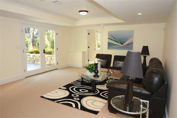 181 Alcott Road Concord, MA 01742 - Photo 25 of 26 a view of a livingroom with furniture and a floor to ceiling window