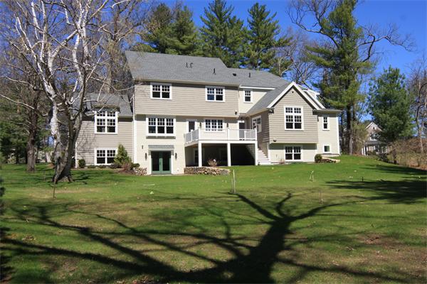 181 Alcott Road Concord, MA 01742 - Photo 6 of 26 a front view of a house with a garden