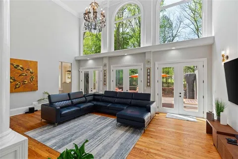 a view of kitchen with cabinets and wooden floor