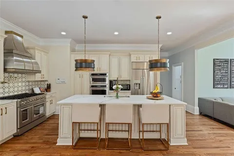 a living room with furniture fireplace and a flat screen tv