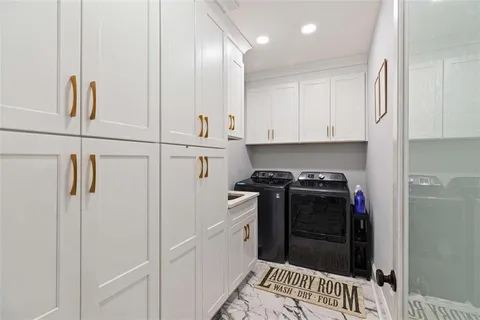 a spacious bedroom with a bed and a window