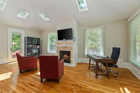 a living room with furniture and a table