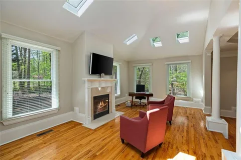 a bathroom with a bath tub and a shower