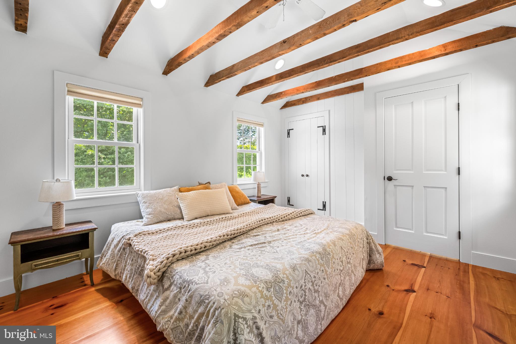 2212 River Bend Court White Hall, MD 21161 - Photo 23 of 40 Charming bedroom with rustic wooden beams.