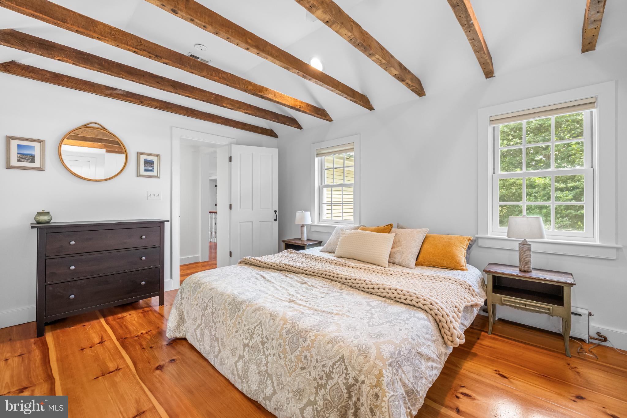 2212 River Bend Court White Hall, MD 21161 - Photo 24 of 40 Charming bedroom with rustic wooden beams.