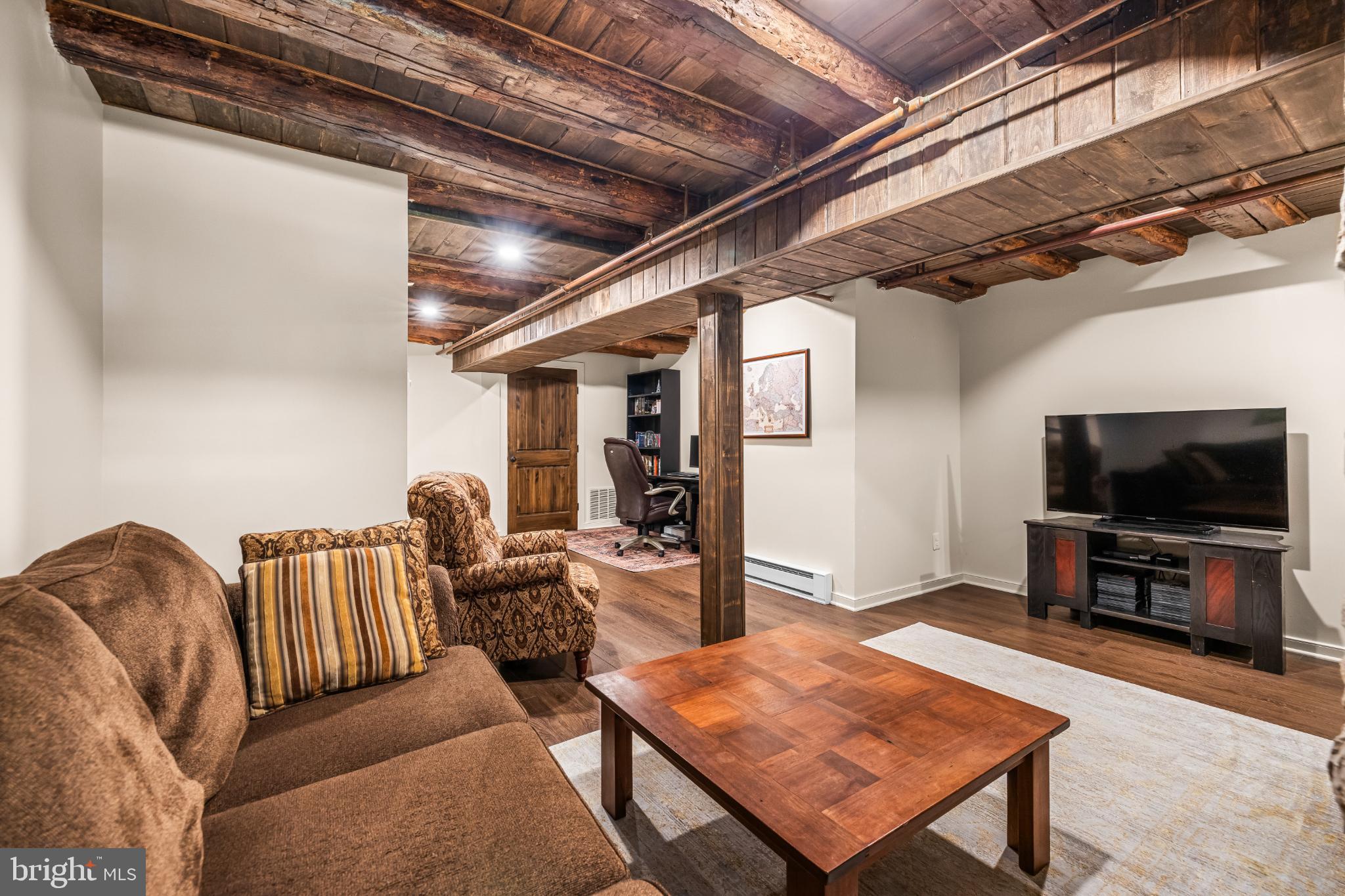 2212 River Bend Court White Hall, MD 21161 - Photo 26 of 40 Cozy basement retreat with rustic charm.