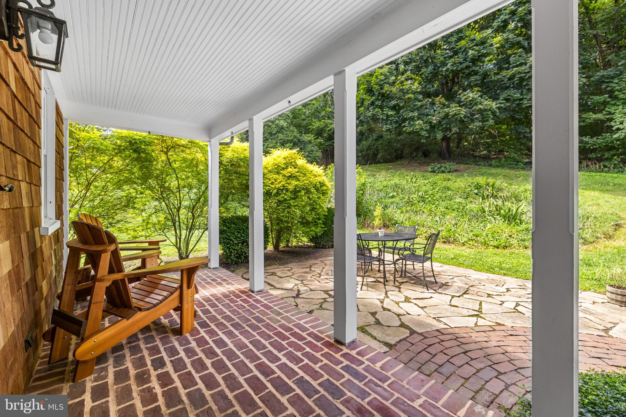 2212 River Bend Court White Hall, MD 21161 - Photo 31 of 40 Serene porch with stone patio view.