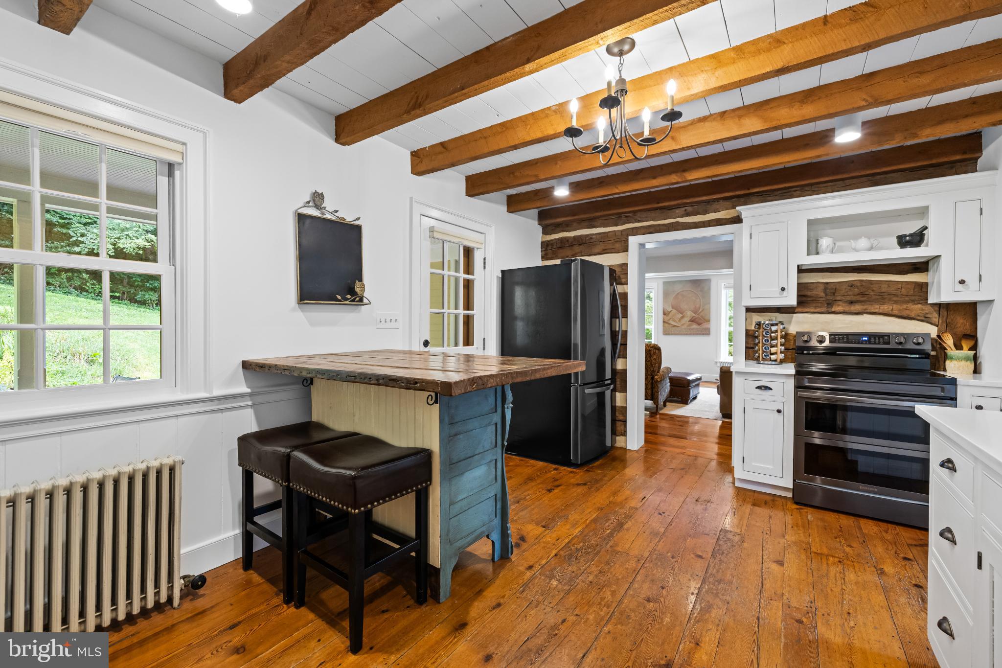 2212 River Bend Court White Hall, MD 21161 - Photo 8 of 40 Charming kitchen with rustic wooden beams.