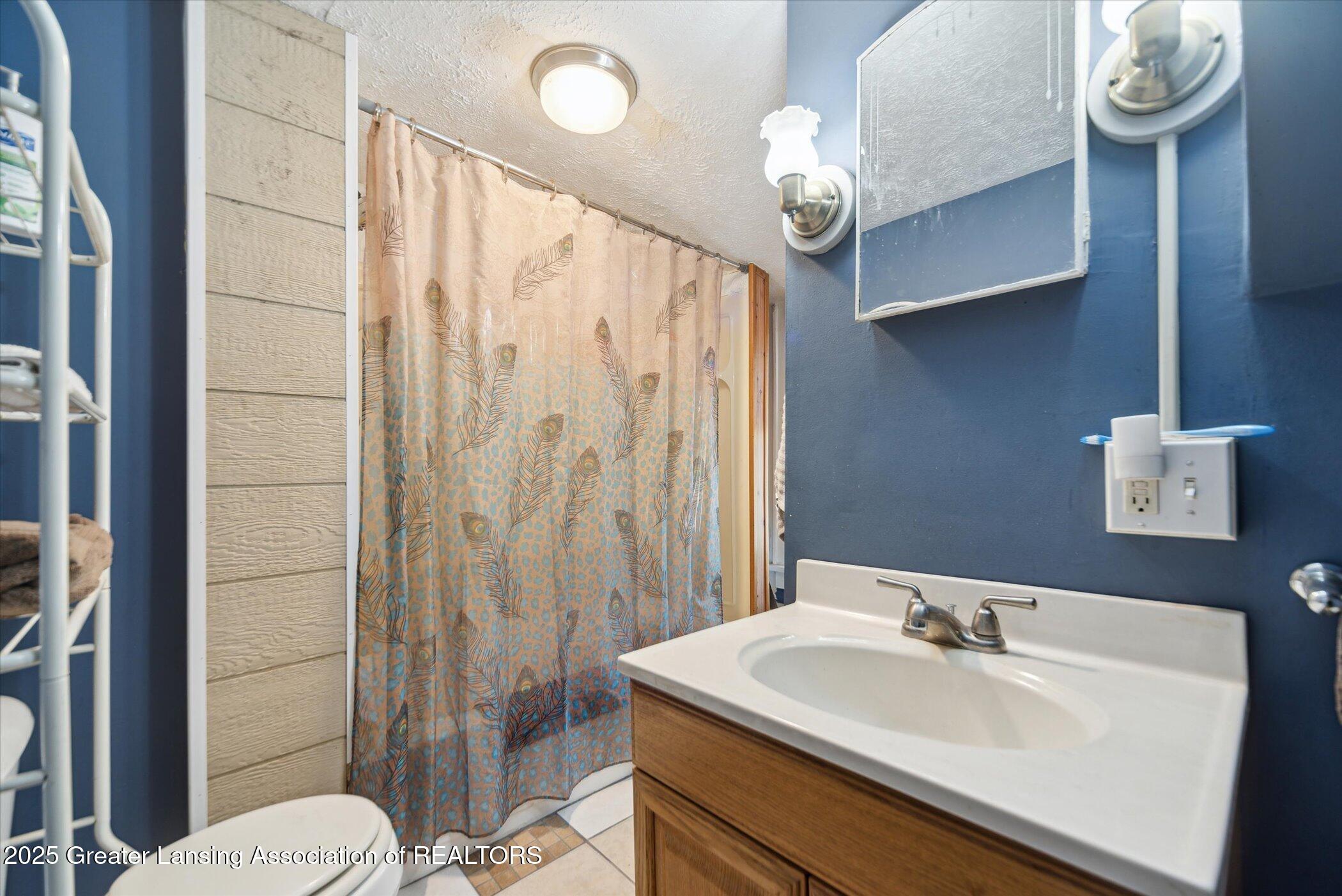 6028 Rolfe Road Lansing, MI 48911 - Photo 22 of 40 22-6028-Rolfe-Rd-Lansing-MI-48911-Window