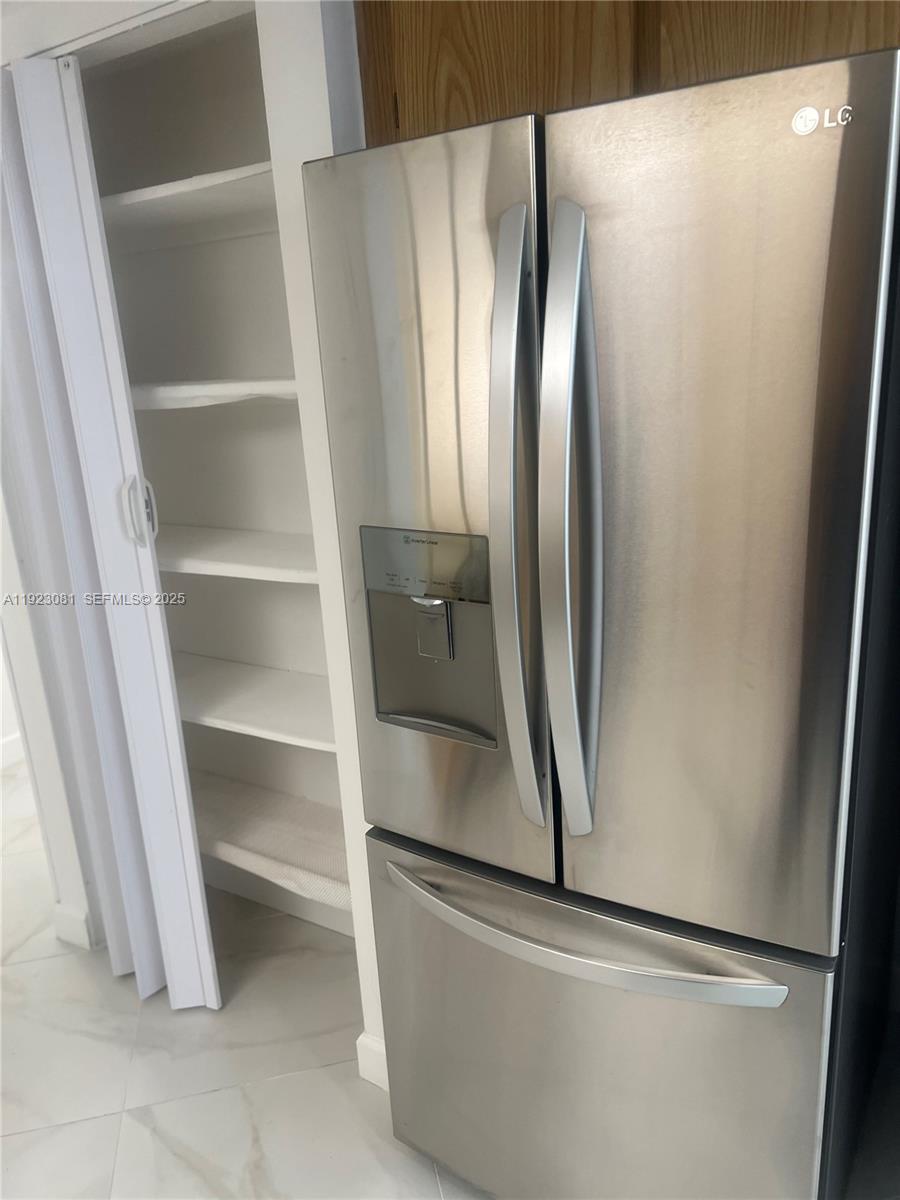 9510 Seagrape Drive, Unit 101 Davie, FL 33324 - Photo 12 of 18 a close view of closet