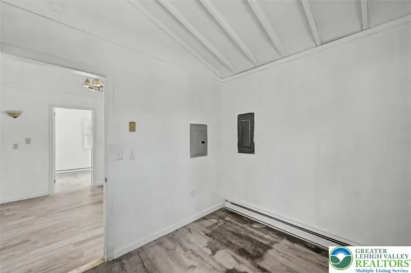 a view of entryway with wooden floor