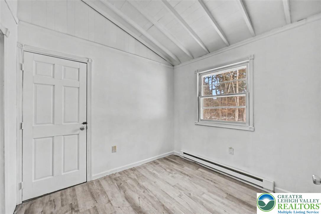 108 Mink Lane Bushkill, PA 18324 - Photo 26 of 33 a view of empty room with wooden floor