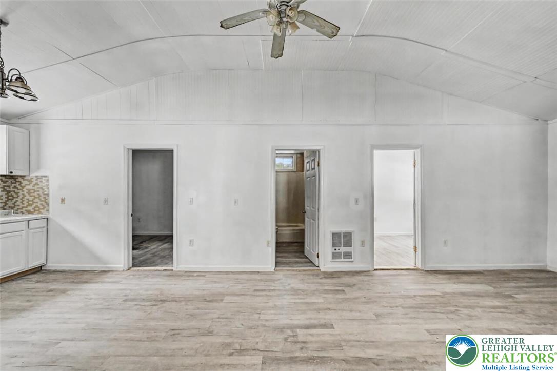 108 Mink Lane Bushkill, PA 18324 - Photo 29 of 33 a view of an empty room with a ceiling fan