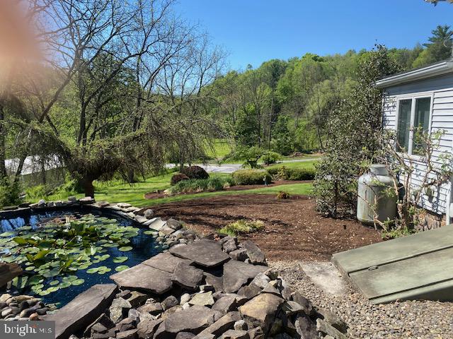 64 Metz Road Thompsontown, PA 17094 - Photo 67 of 69 Serene garden with tranquil pond.