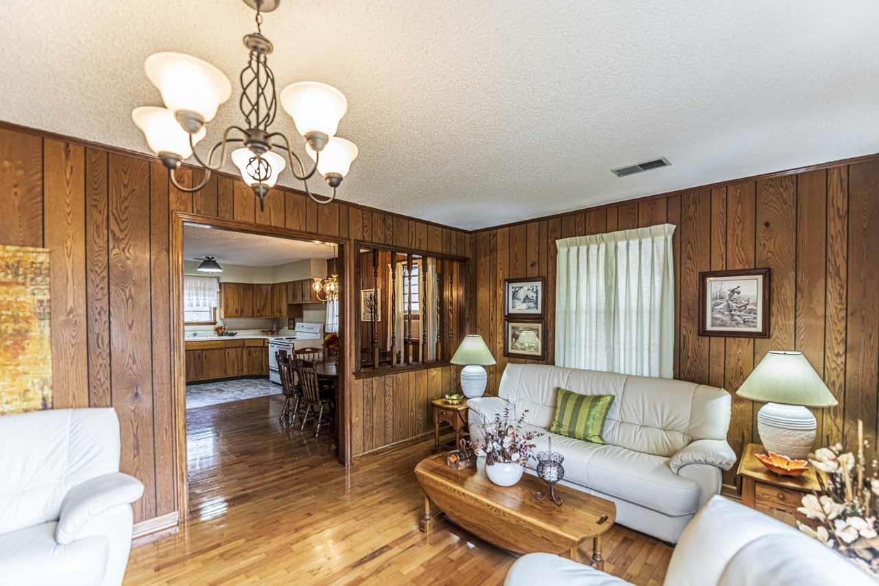 3285 Munford Giltedge Road Drummonds, TN 38023 - Photo 13 of 32 a living room with fireplace furniture and a large window