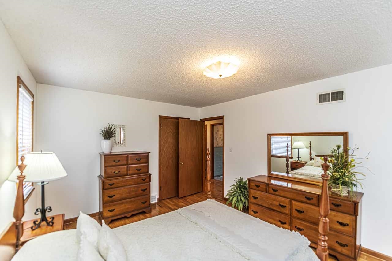 3285 Munford Giltedge Road Drummonds, TN 38023 - Photo 15 of 32 a bedroom with furniture and a mirror