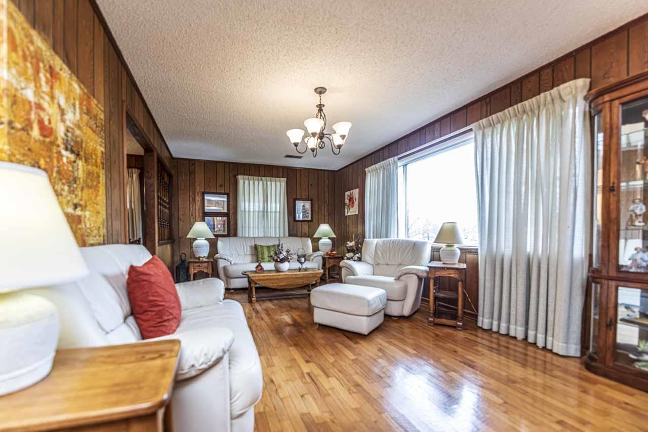 3285 Munford Giltedge Road Drummonds, TN 38023 - Photo 5 of 32 a living room with furniture and a chandelier