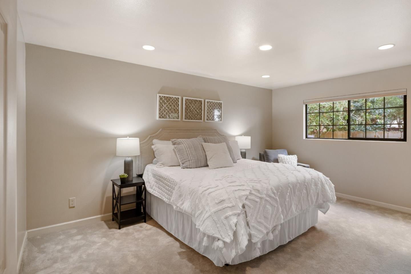777 Parcel Street Monterey, CA 93940 - Photo 12 of 21 a bedroom with a bed and a night stand