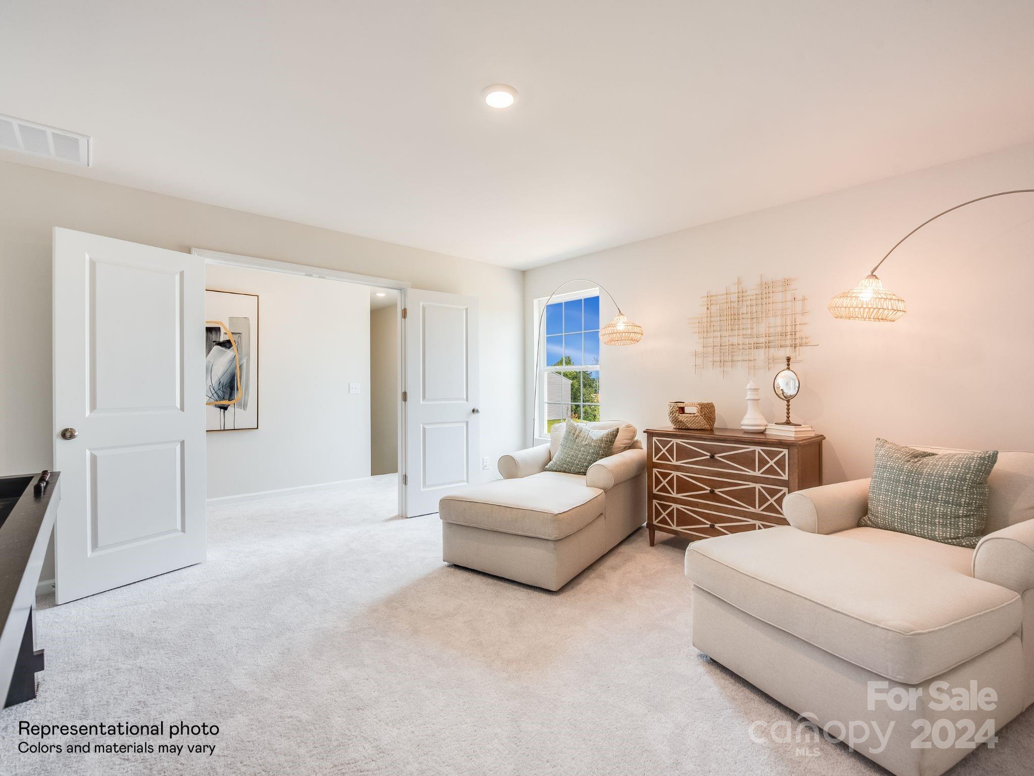 13228 Hampton Bay Lane Charlotte, NC 28262 - Photo 11 of 25 a living room with furniture and a large window