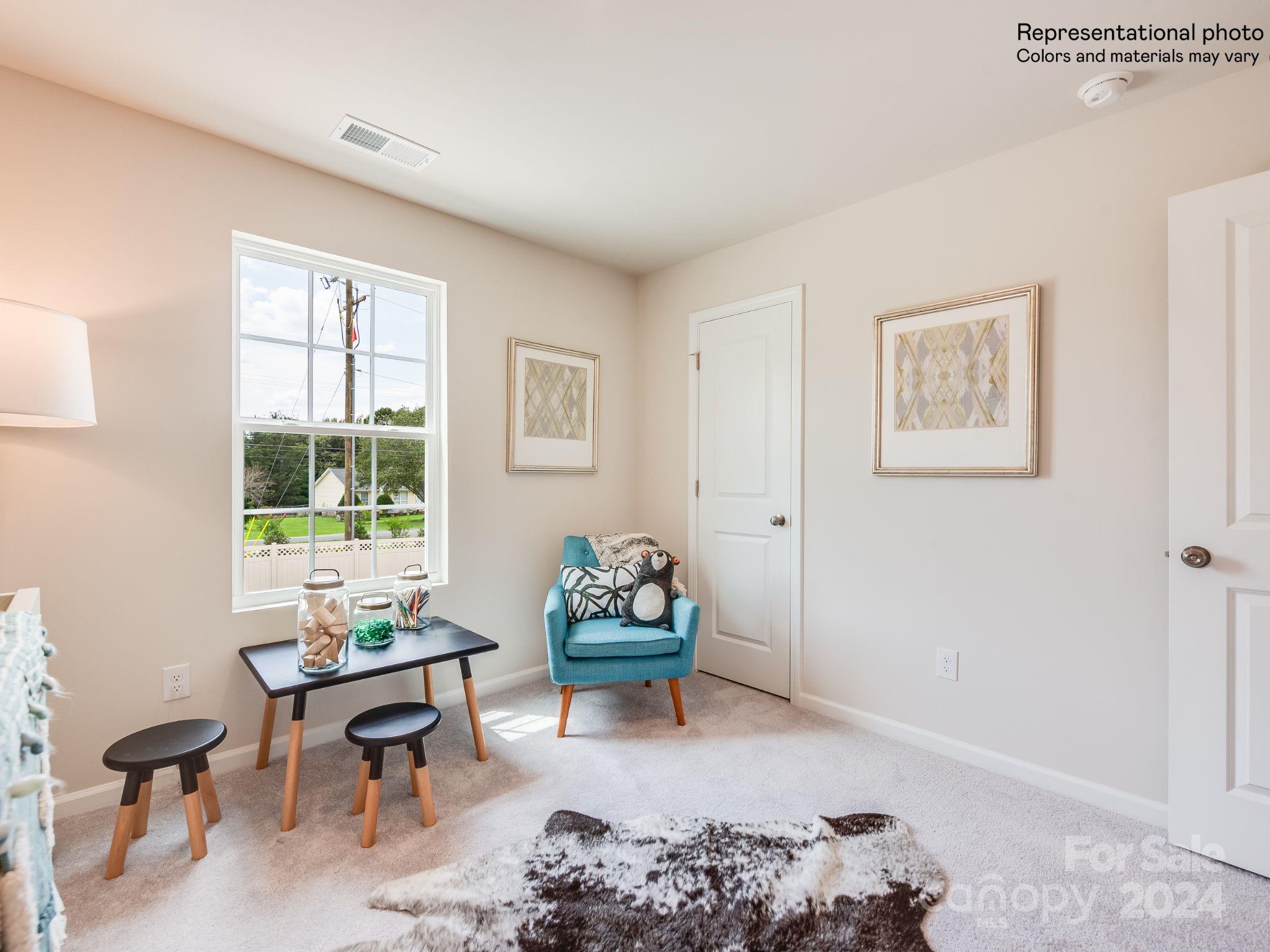 13228 Hampton Bay Lane Charlotte, NC 28262 - Photo 16 of 25 a living room with furniture and a window