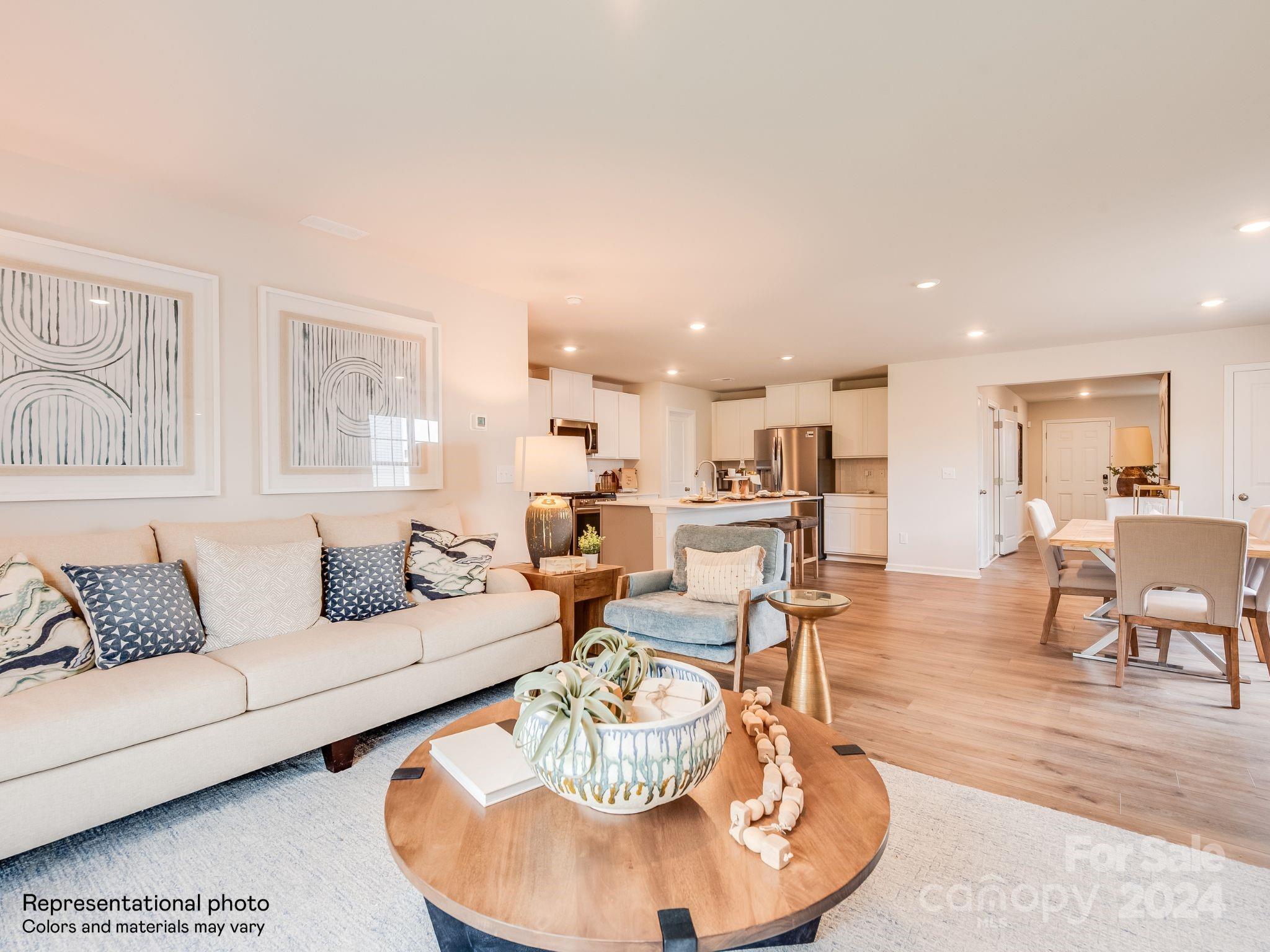 13228 Hampton Bay Lane Charlotte, NC 28262 - Photo 3 of 25 a living room with furniture kitchen and a table