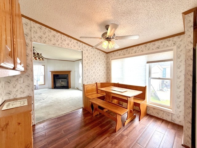 9 Swallow Lane Beecher, IL 60401 - Photo 13 of 20 a living room with a flat screen tv and a fireplace