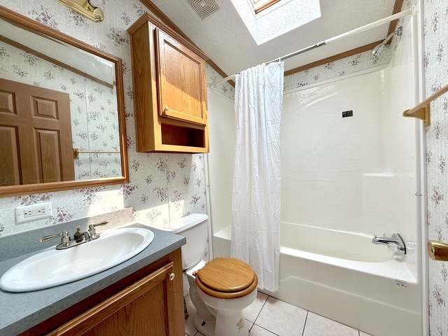 9 Swallow Lane Beecher, IL 60401 - Photo 20 of 20 a bathroom with a sink toilet a mirror and shower