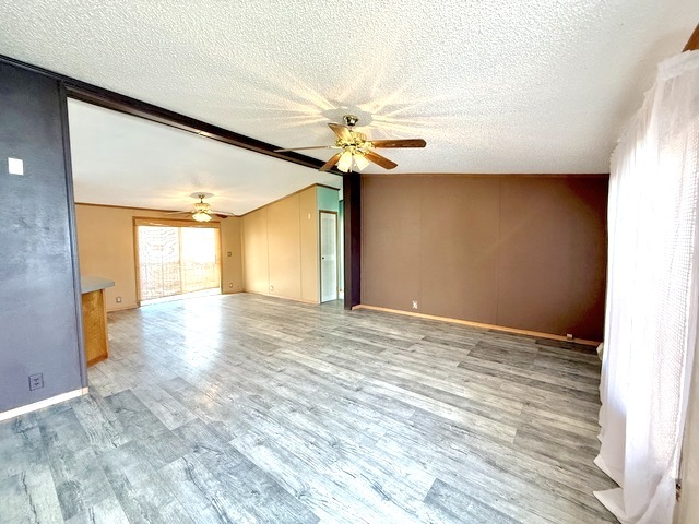 9 Swallow Lane Beecher, IL 60401 - Photo 6 of 20 a view of a livingroom with a ceiling fan and window