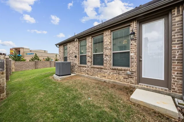 a house view with a backyard space