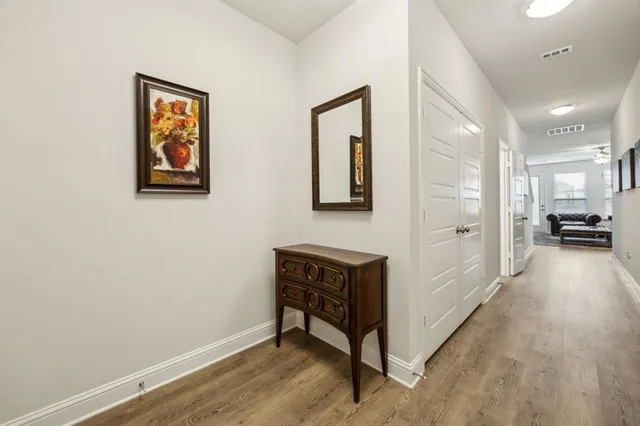 a view of a hallway with workspace