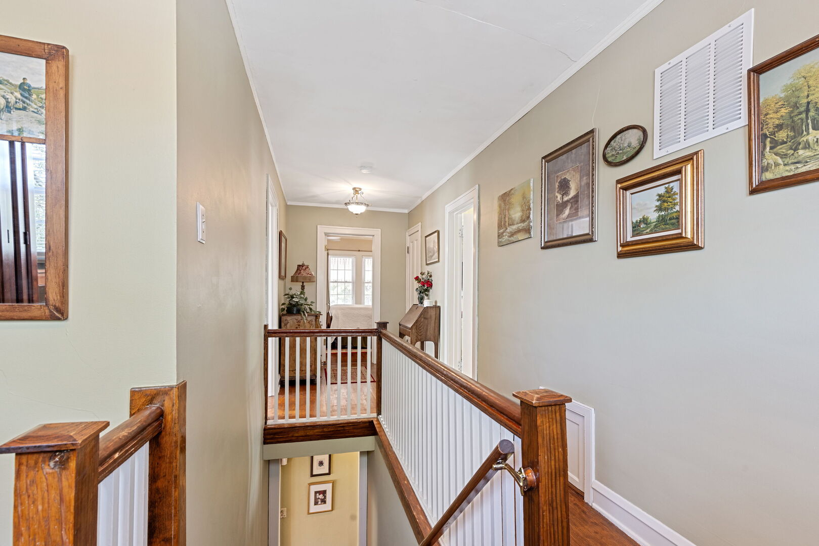 1361 Elizabeth Street Crete, IL 60417 - Photo 11 of 31 a view of a hallway with wooden floor and windows