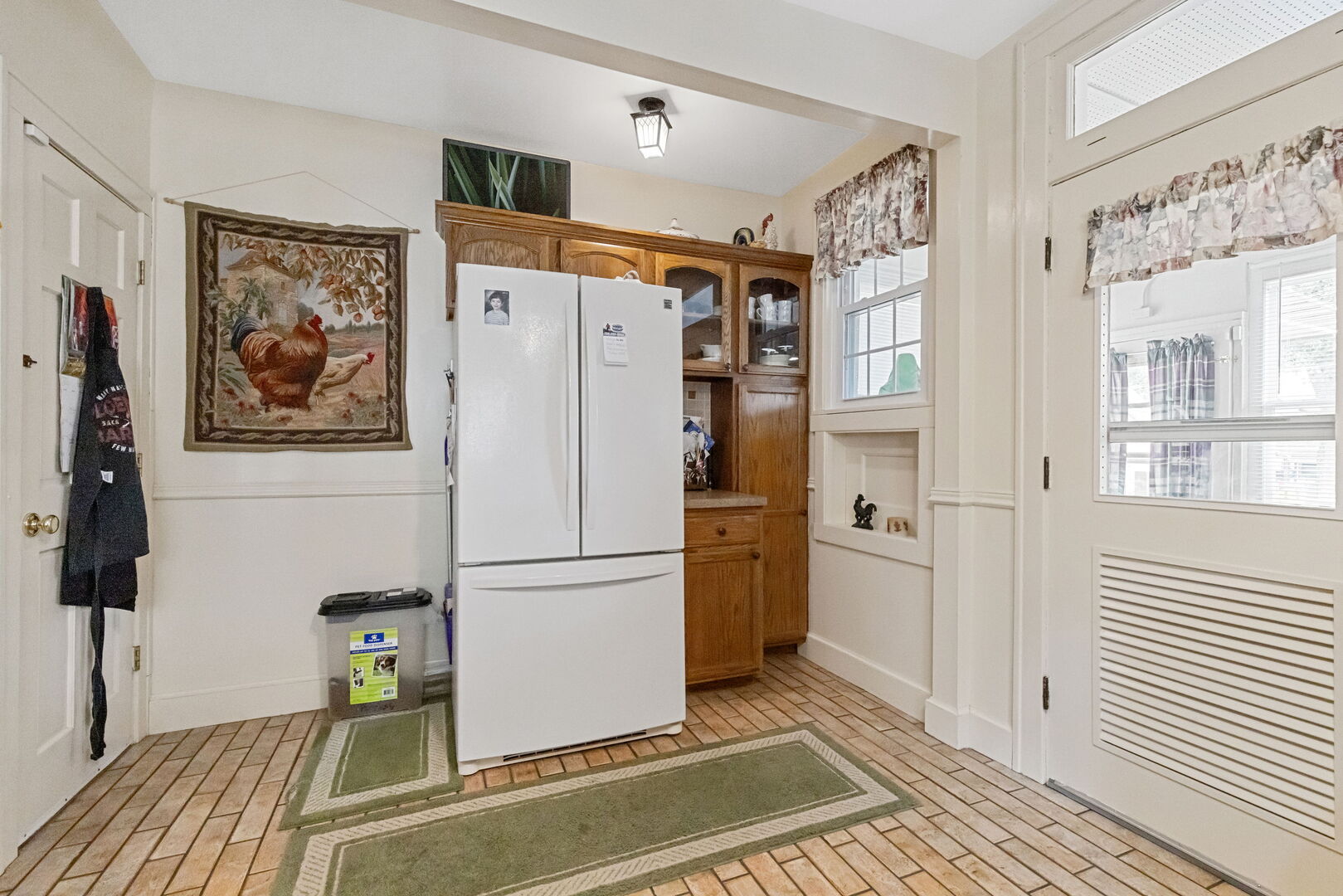 1361 Elizabeth Street Crete, IL 60417 - Photo 7 of 31 a white refrigerator freezer sitting inside of a kitchen