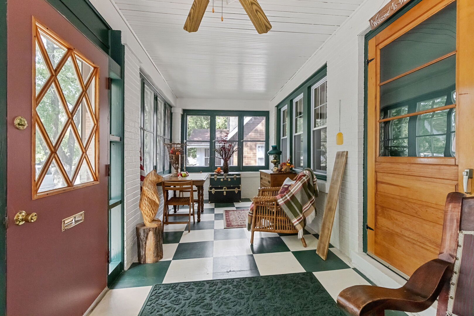 1361 Elizabeth Street Crete, IL 60417 - Photo 8 of 31 a living room with furniture a rug stairs and a large window