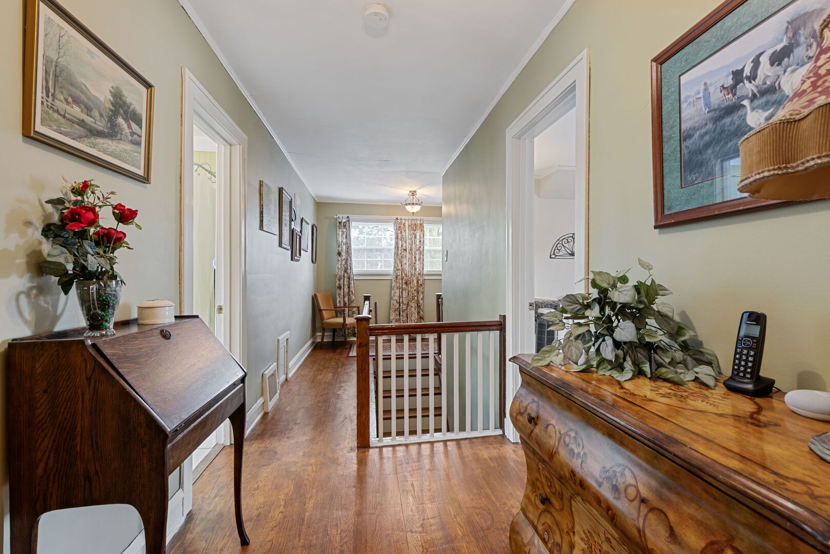 1361 Elizabeth Street Crete, IL 60417 - Photo 10 of 31 a very nice looking room with a large window a couch and a potted plant
