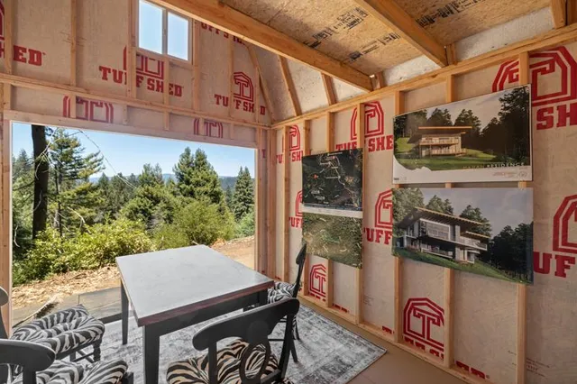 a view of a street with sitting area