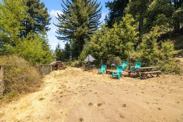 a view of a yard with patio