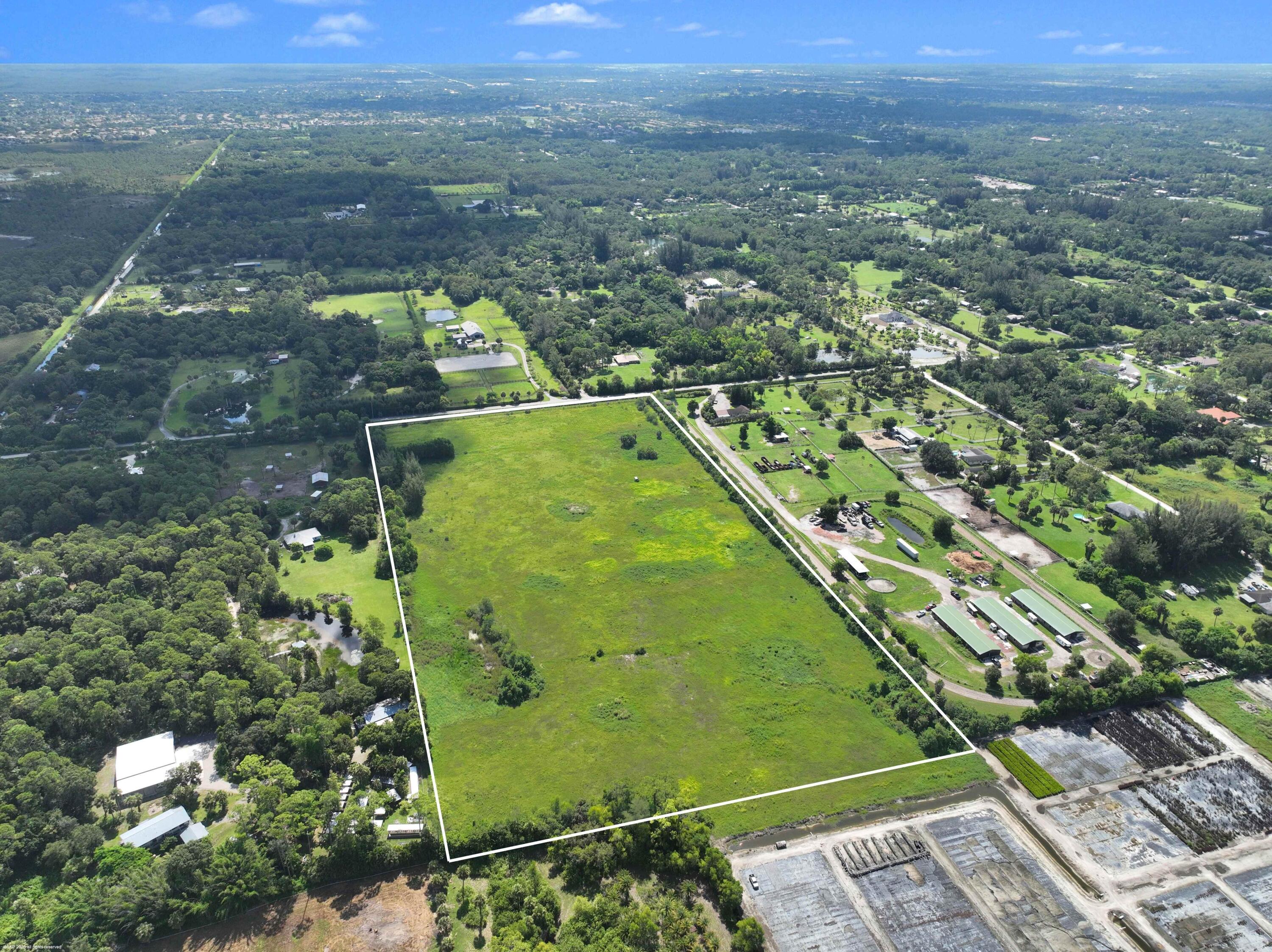 2761 E Road Loxahatchee Groves, FL 33470 - Photo 16 of 21 a view of a city