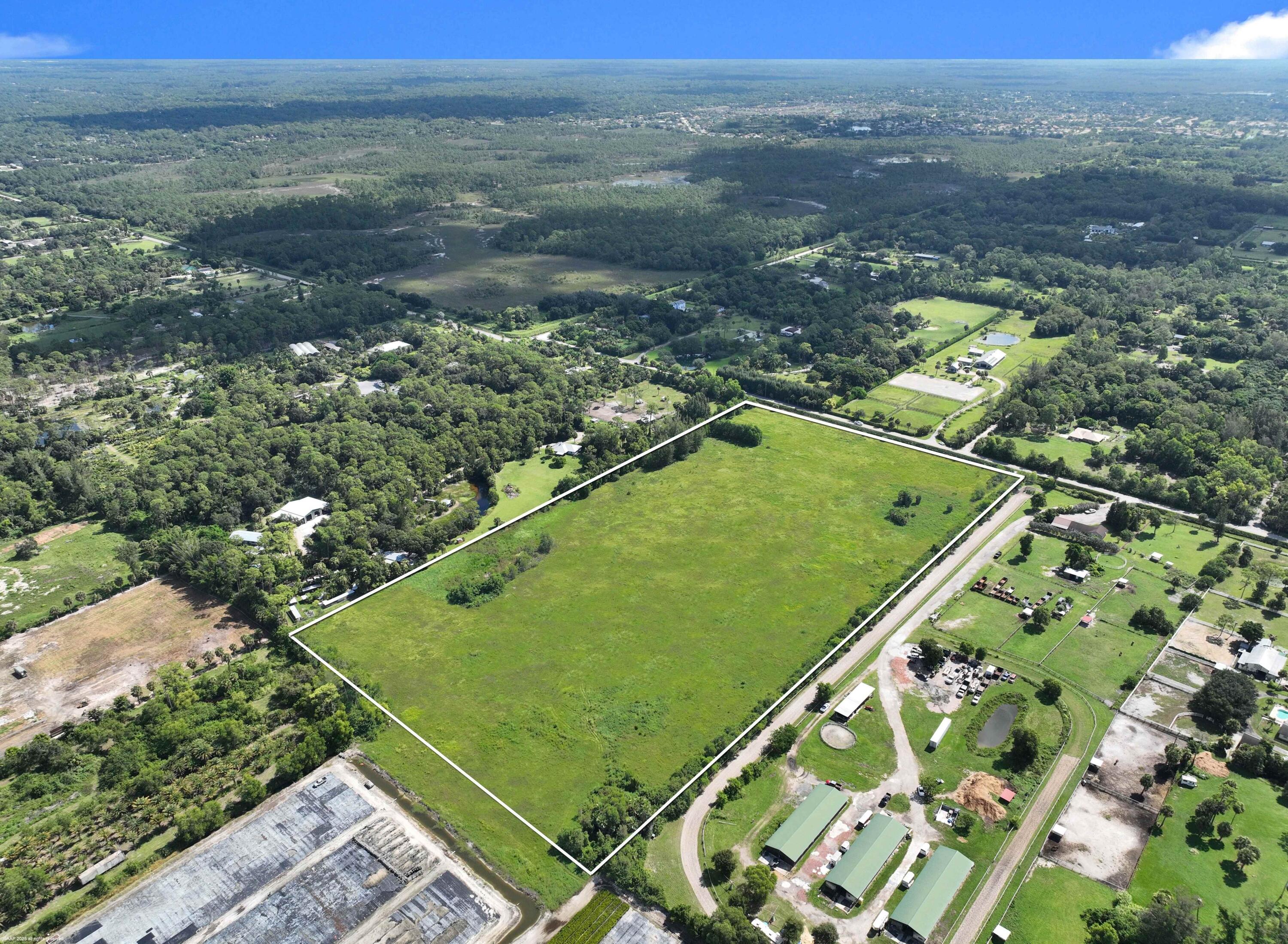 2761 E Road Loxahatchee Groves, FL 33470 - Photo 4 of 21 an aerial view of a football ground