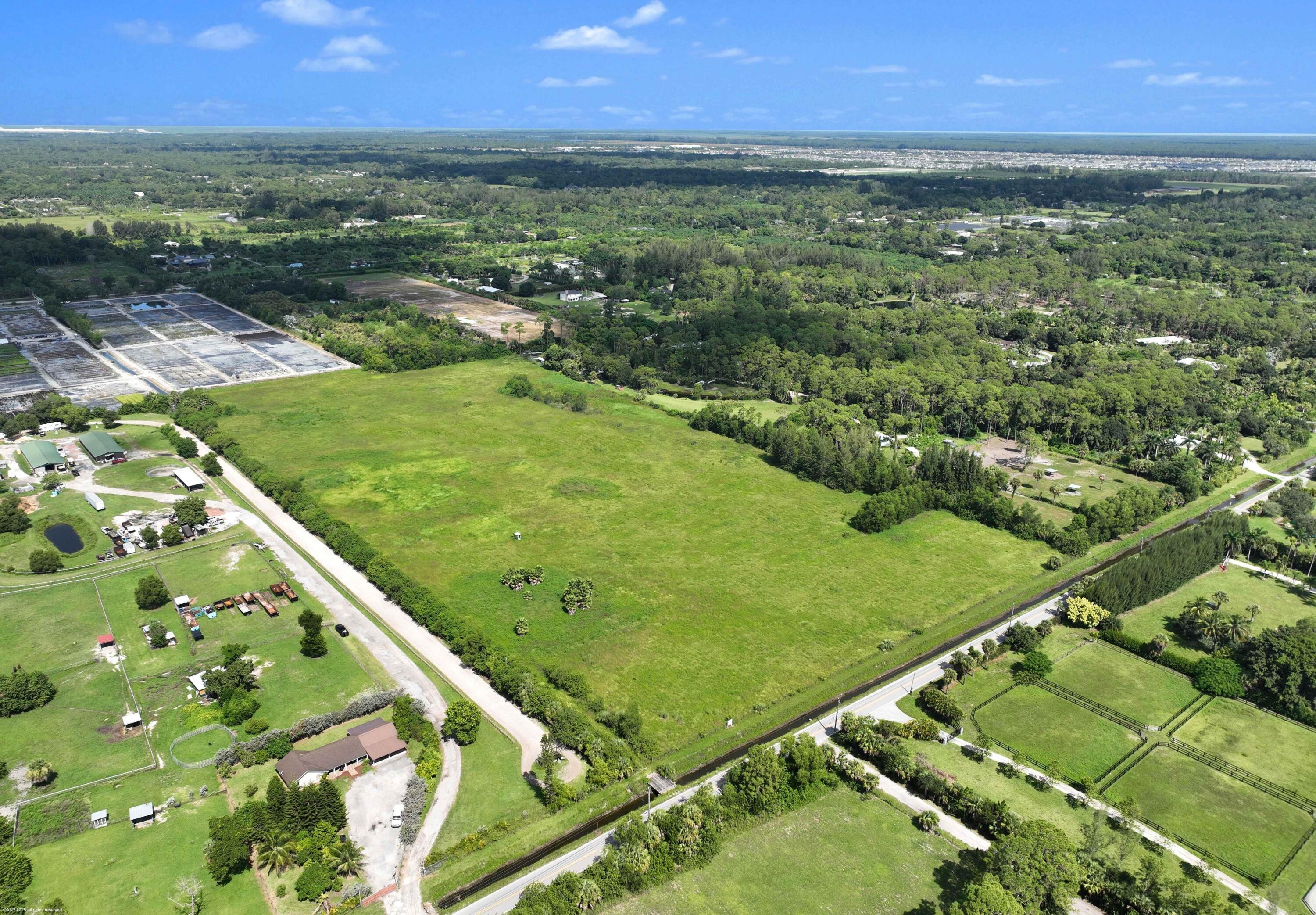 2761 E Road Loxahatchee Groves, FL 33470 - Photo 5 of 21 a view of a city