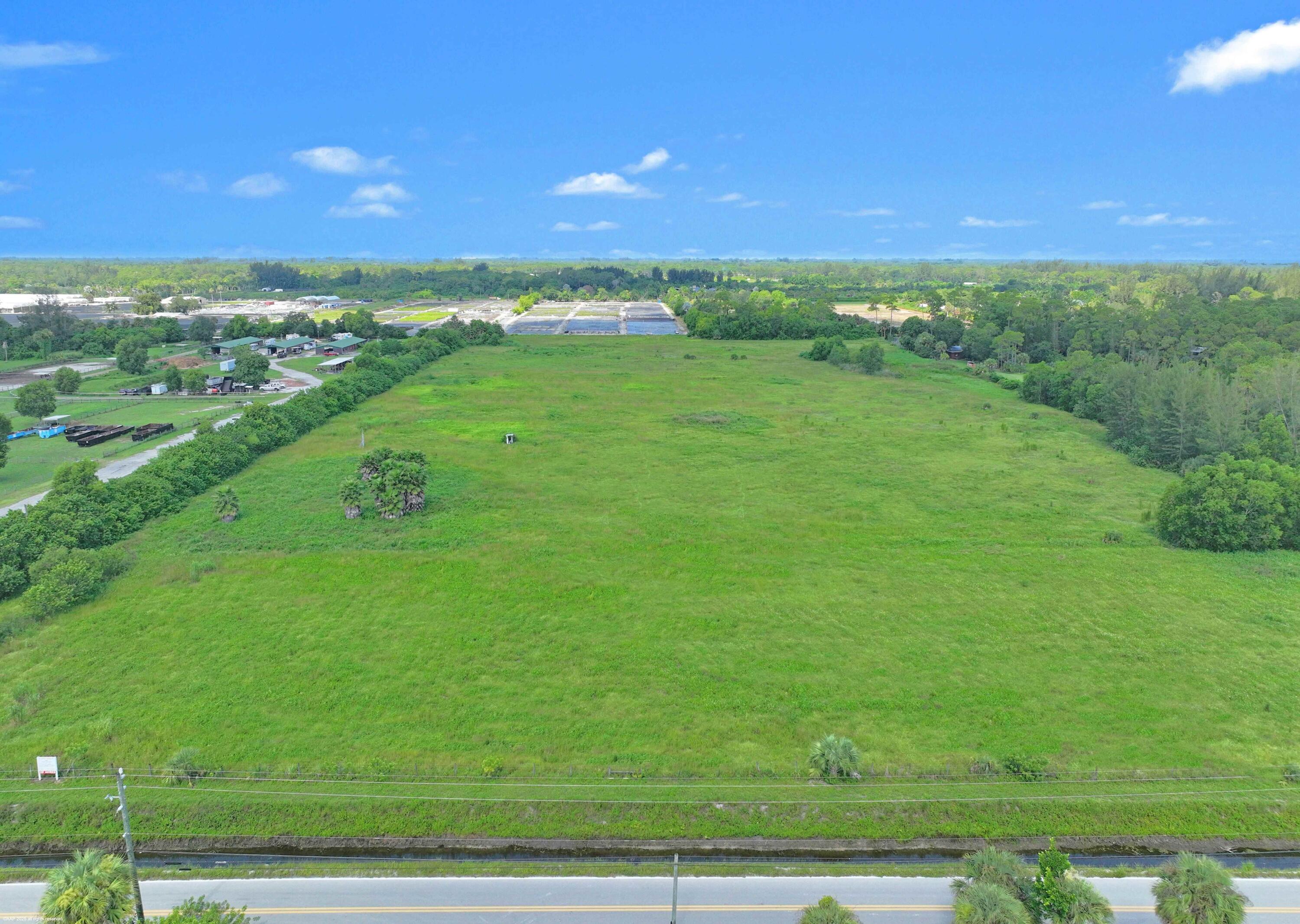 2761 E Road Loxahatchee Groves, FL 33470 - Photo 8 of 21 a view of a city